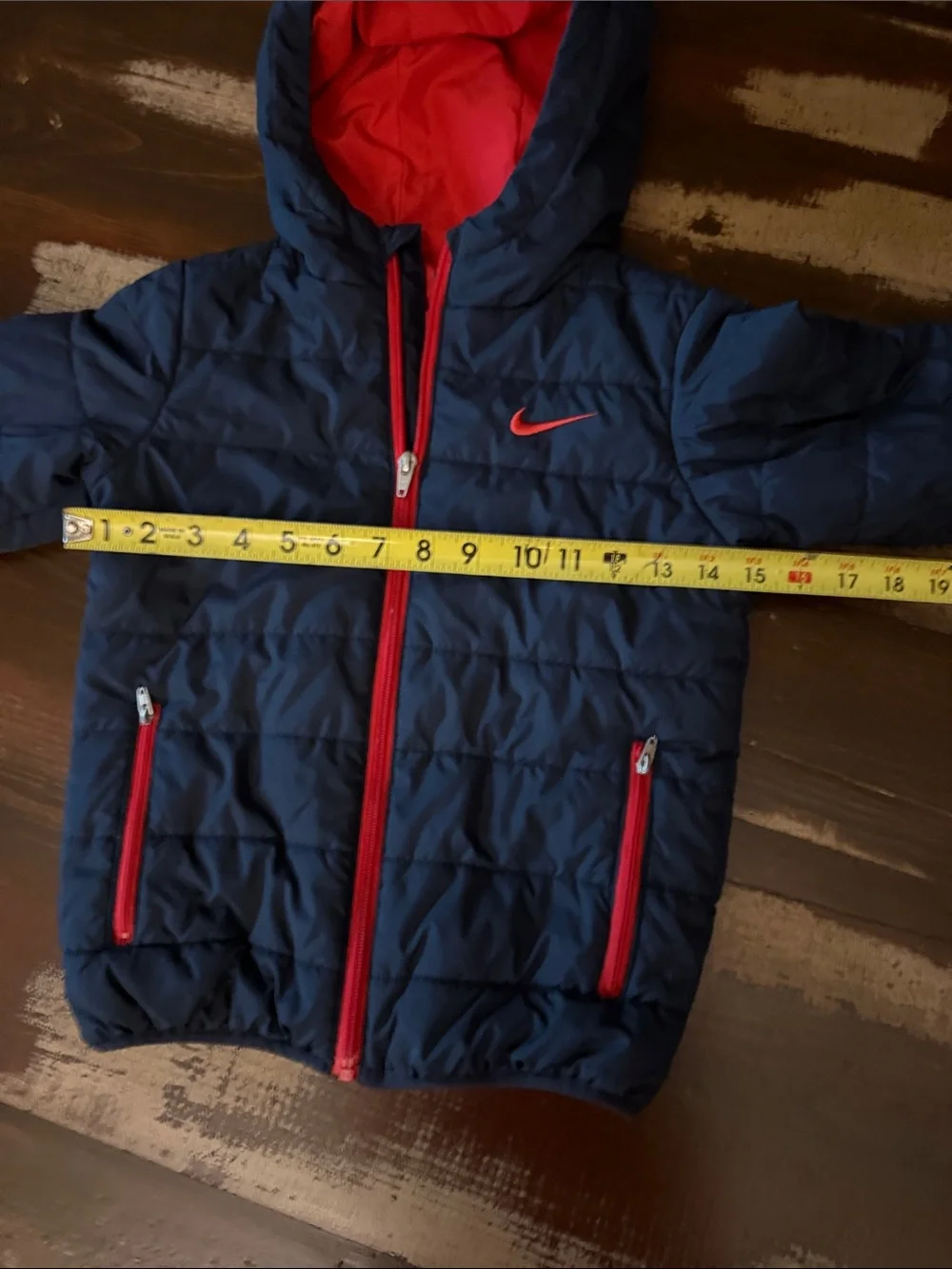 Nike Kids Navy Puffer Jacket with Red Trim and Hood Lining